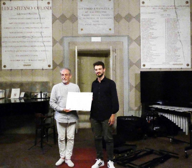 LONGIANO (FC): COMPOSIZIONE MUSICALE DEDICATA A TITO BALESTRA SUONATA A NEW YORK